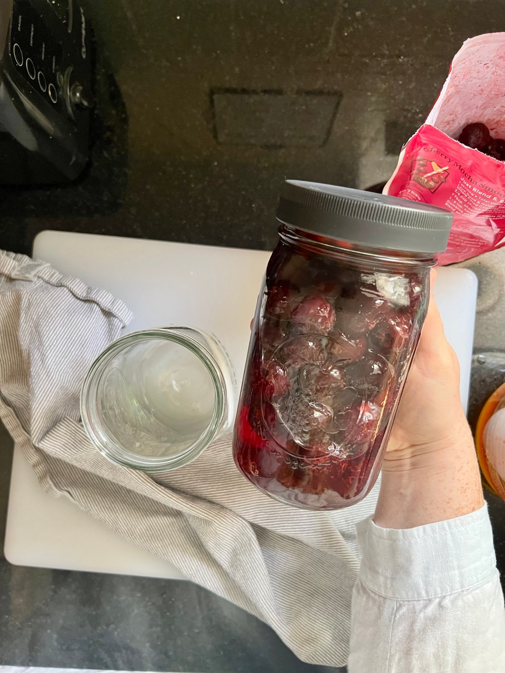 frozen cherries in mason jar